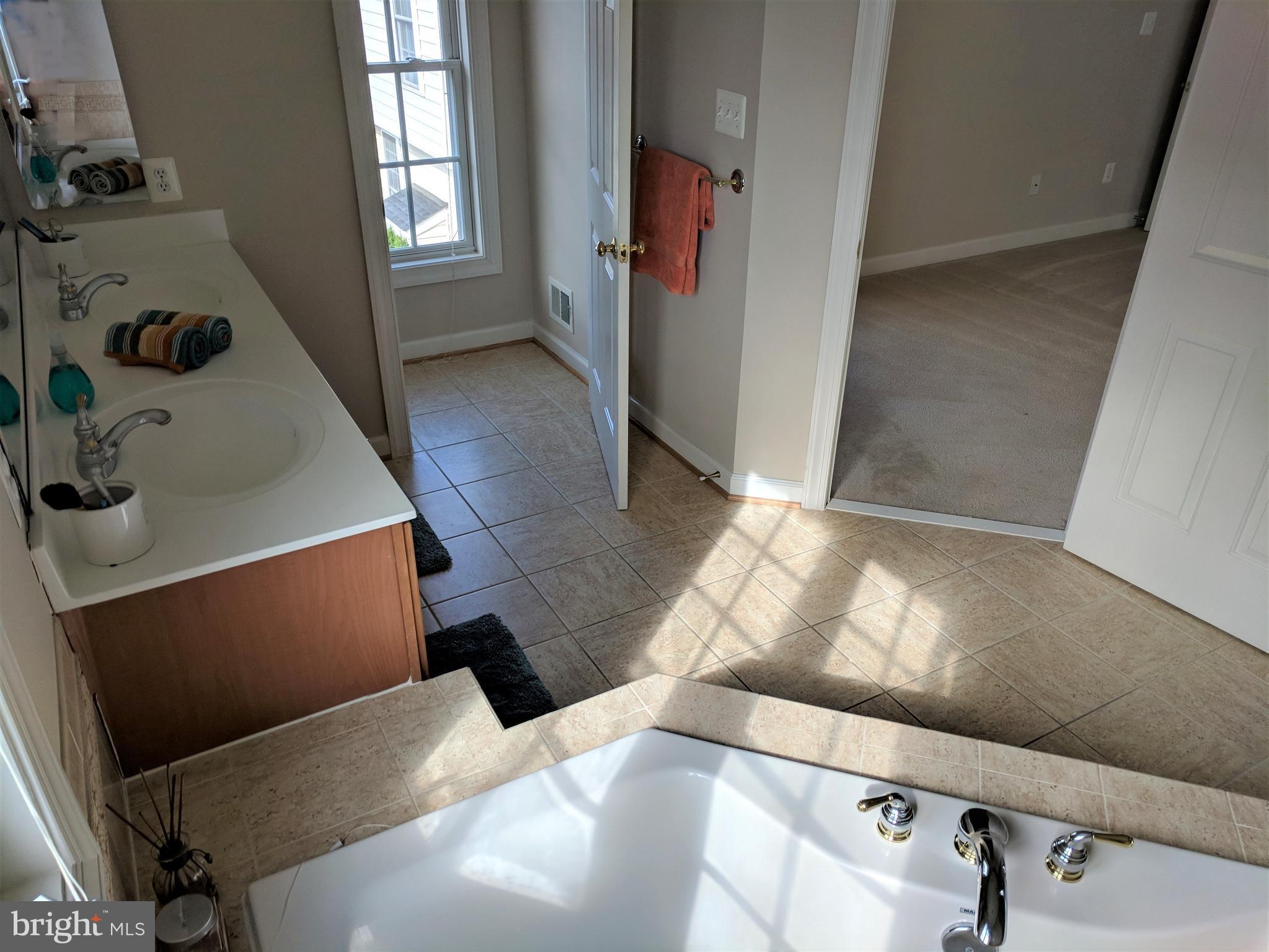 23014 Birch Mead Road Clarksburg, MD 20871 - Photo 17 of 30 The luxury and privacy of a separate toilet room.