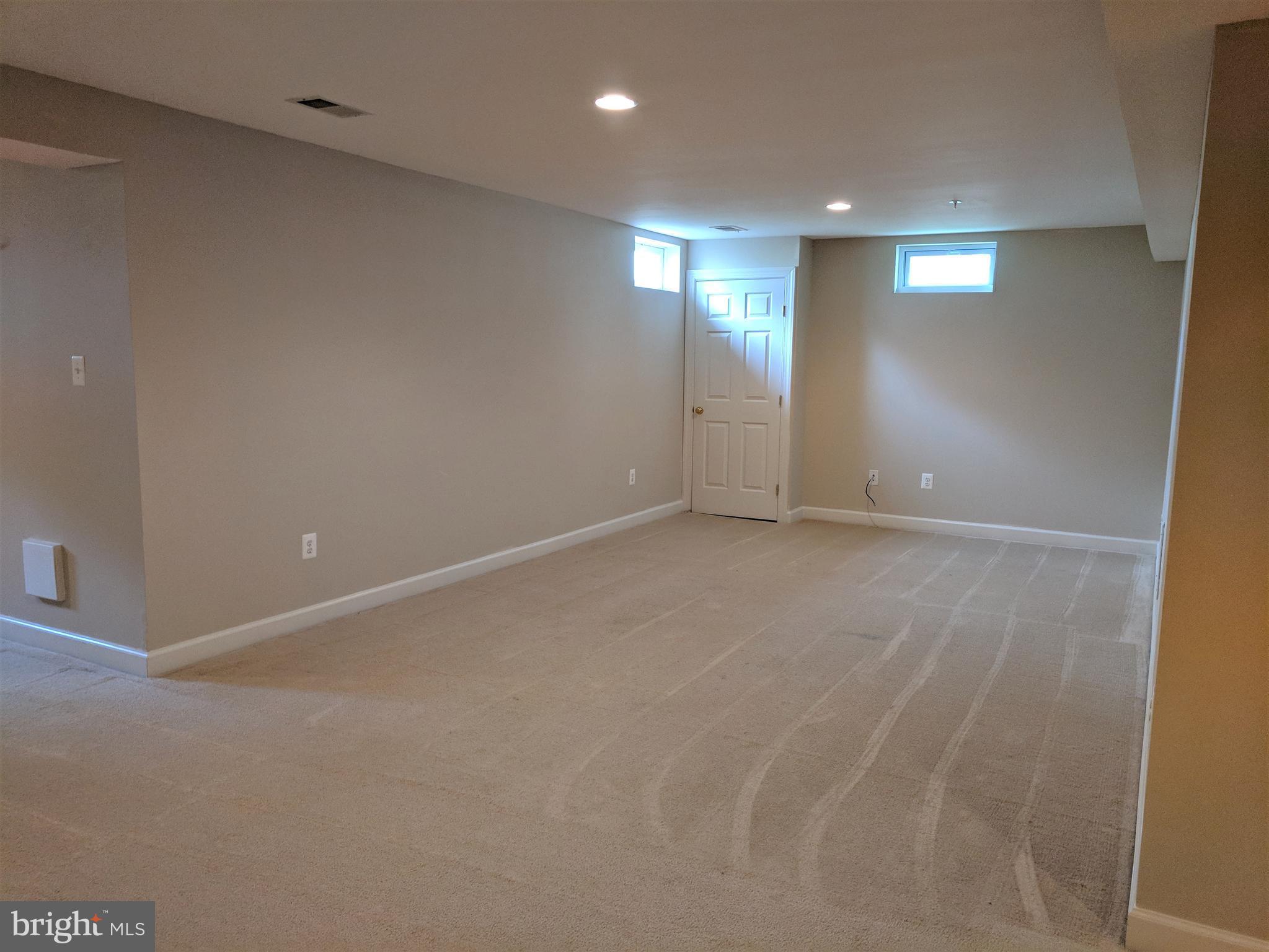 23014 Birch Mead Road Clarksburg, MD 20871 - Photo 24 of 30 Three distinct areas in T shaped basement design.