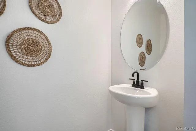 a bathroom with a toilet and a sink