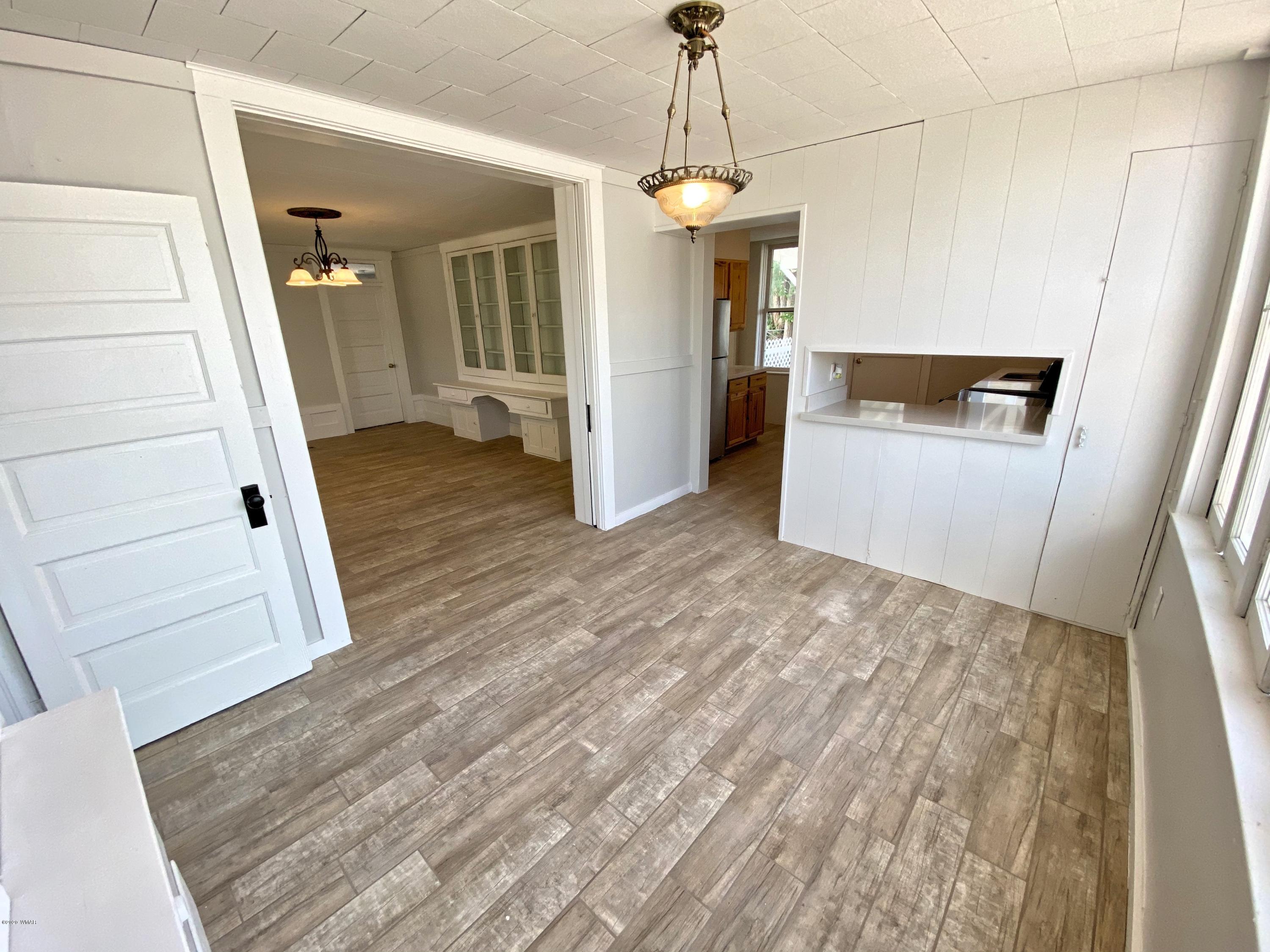 370 South 3rd Street West Snowflake, AZ 85937 - Photo 15 of 53 a view of a hallway view with wooden floor and staircase