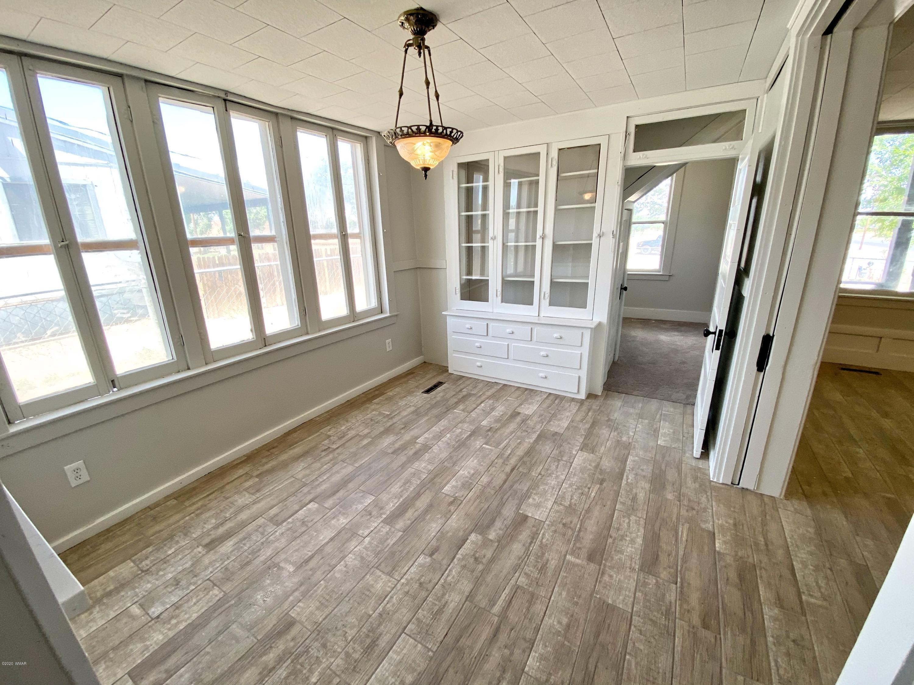 370 South 3rd Street West Snowflake, AZ 85937 - Photo 17 of 53 a view of wooden floor and windows in a room