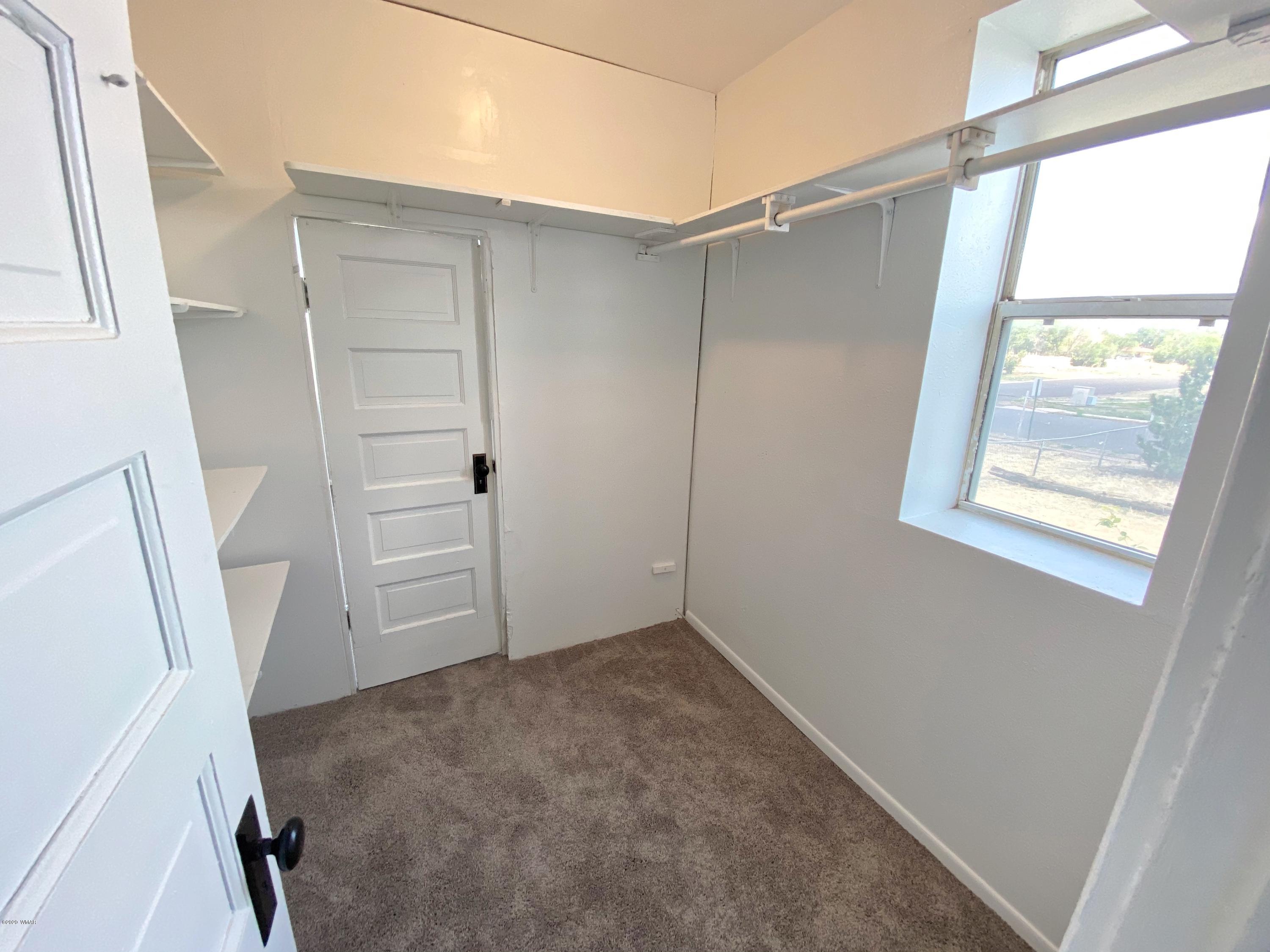 370 South 3rd Street West Snowflake, AZ 85937 - Photo 26 of 53 an empty room with windows
