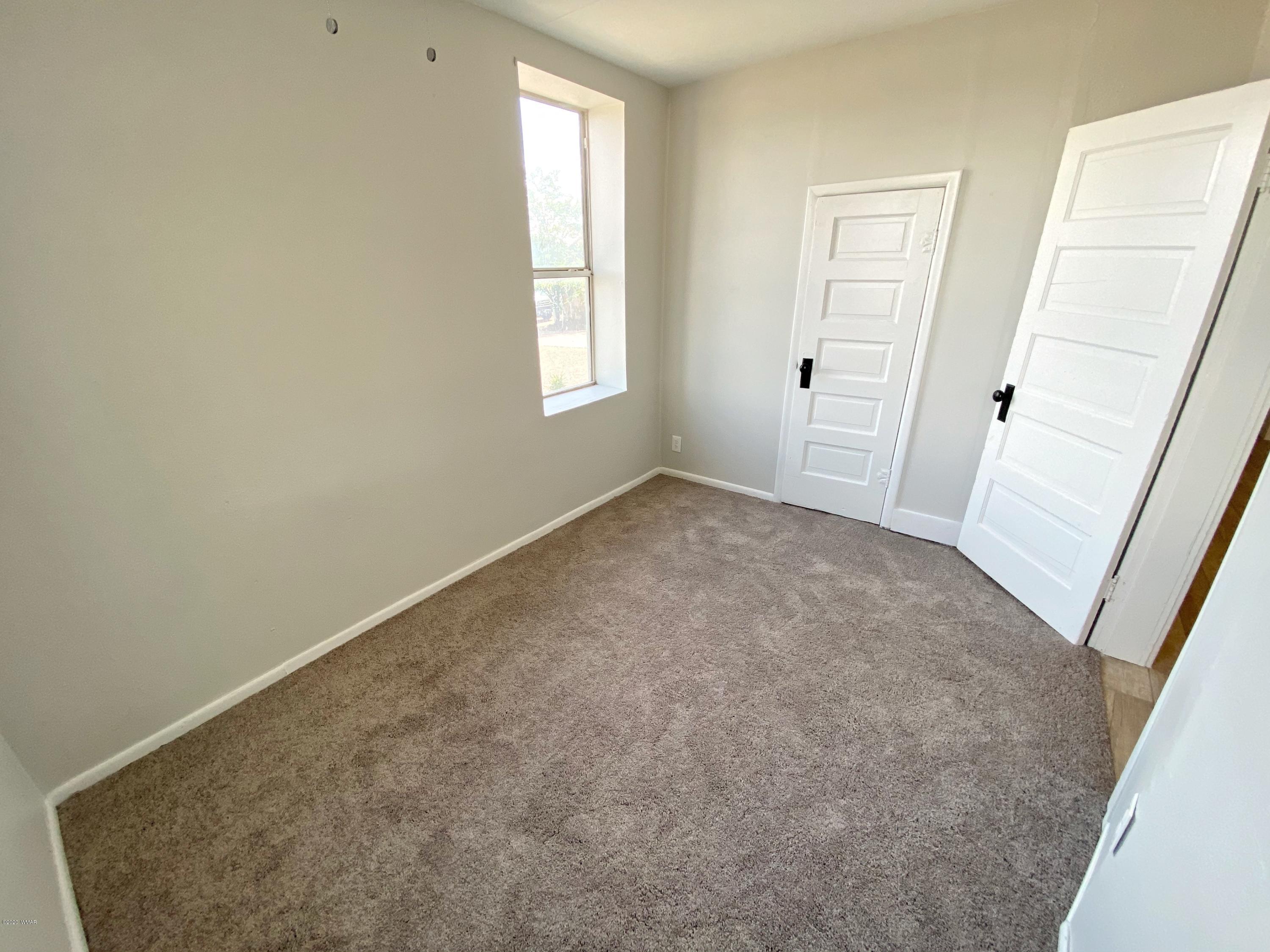 370 South 3rd Street West Snowflake, AZ 85937 - Photo 28 of 53 an empty room with windows