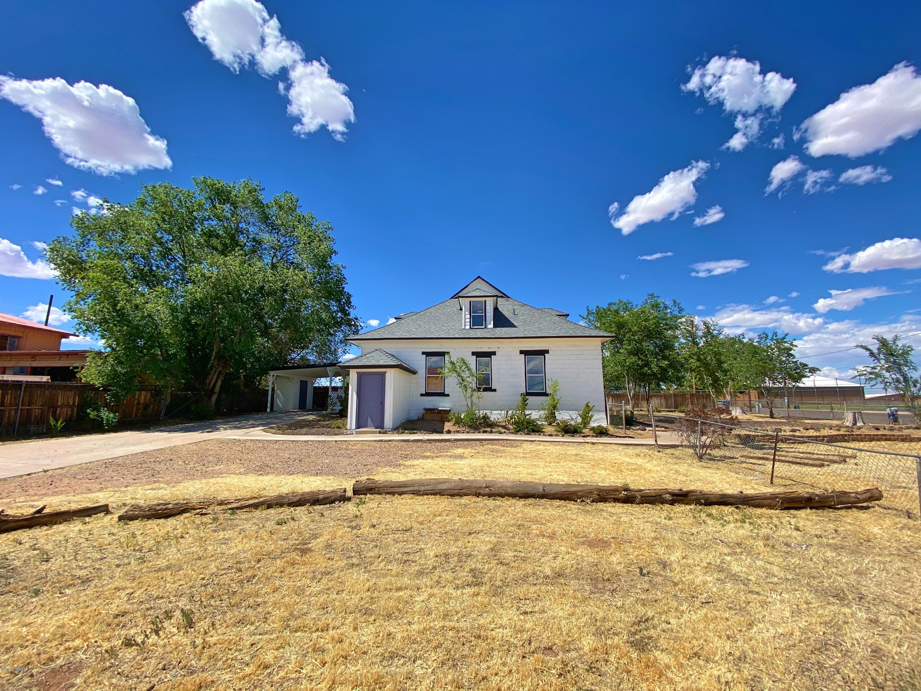 370 South 3rd Street West Snowflake, AZ 85937 - Photo 4 of 53 a view of a house with a swimming pool
