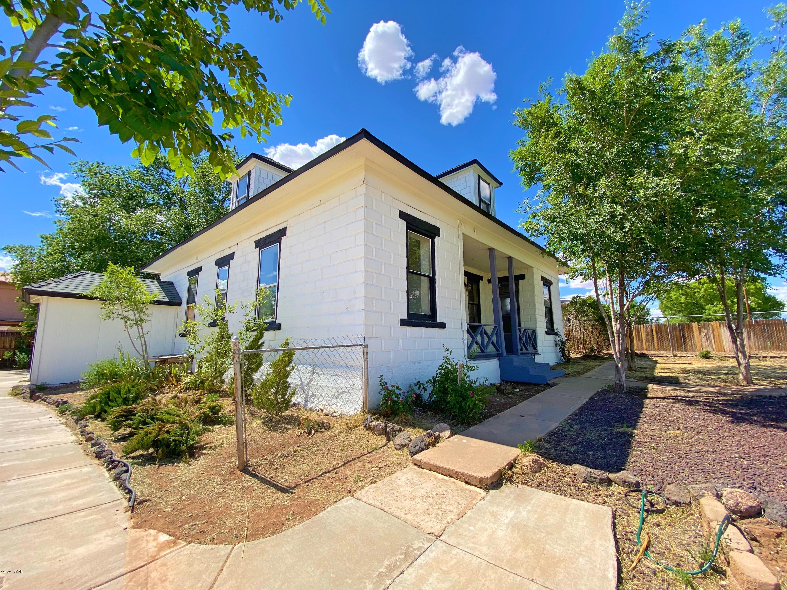 370 South 3rd Street West Snowflake, AZ 85937 - Photo 51 of 53 a front view of a house with a yard