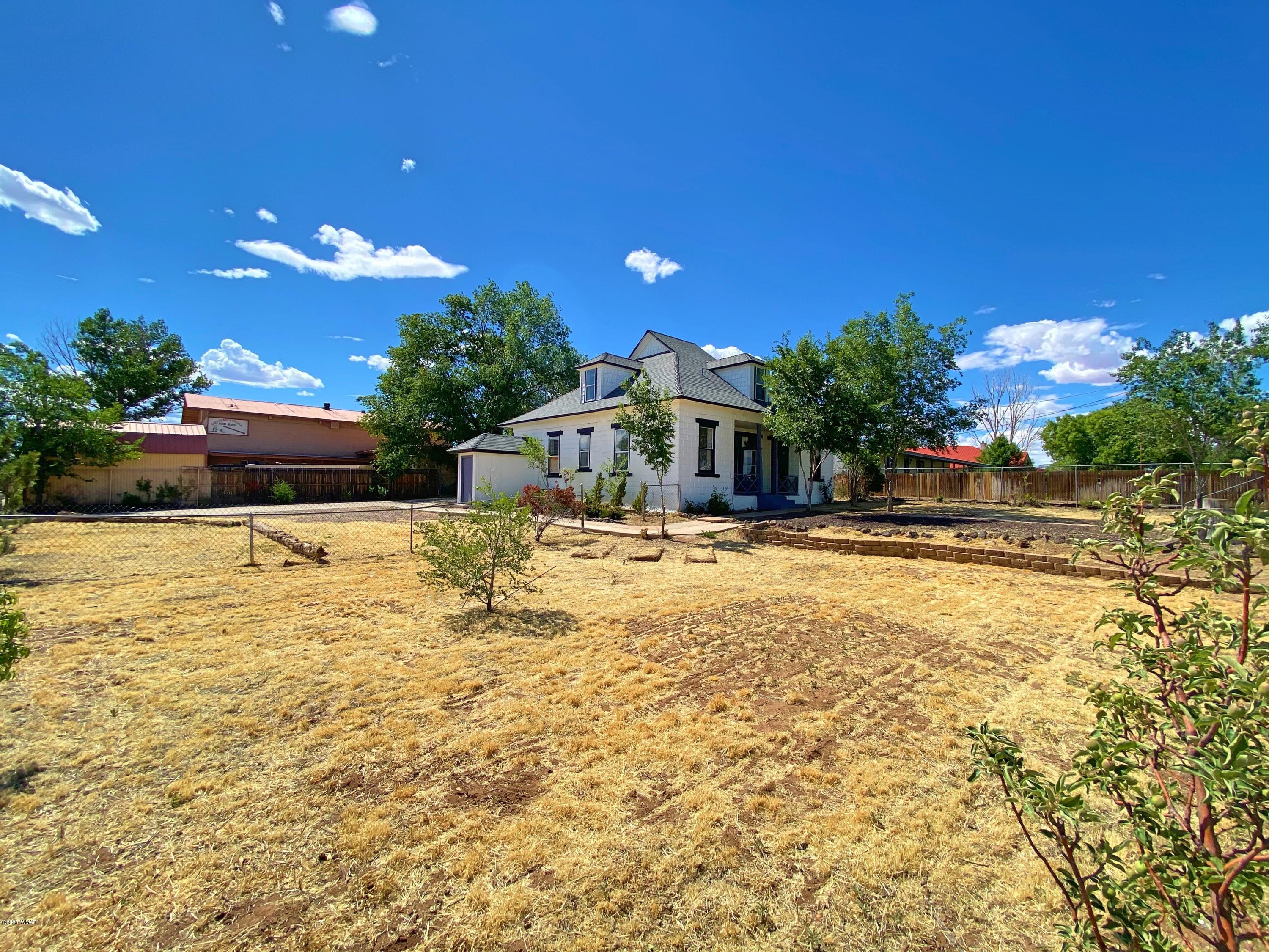 370 South 3rd Street West Snowflake, AZ 85937 - Photo 52 of 53 a swimming pool with outdoor seating and yard