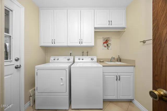 a large room with a large bed and furniture