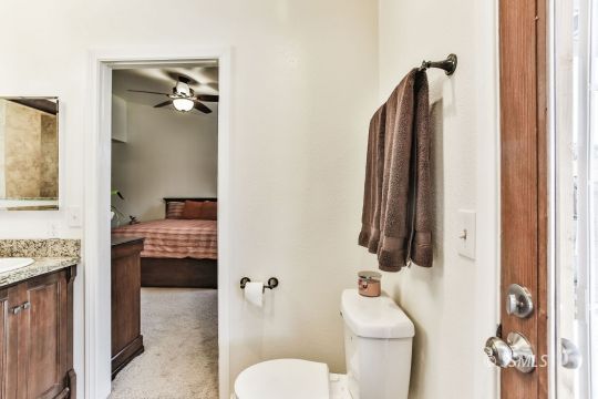 205 North Broadway Street Ridgecrest, CA 93555 - Photo 25 of 29 a bathroom with a sink toilet and tub