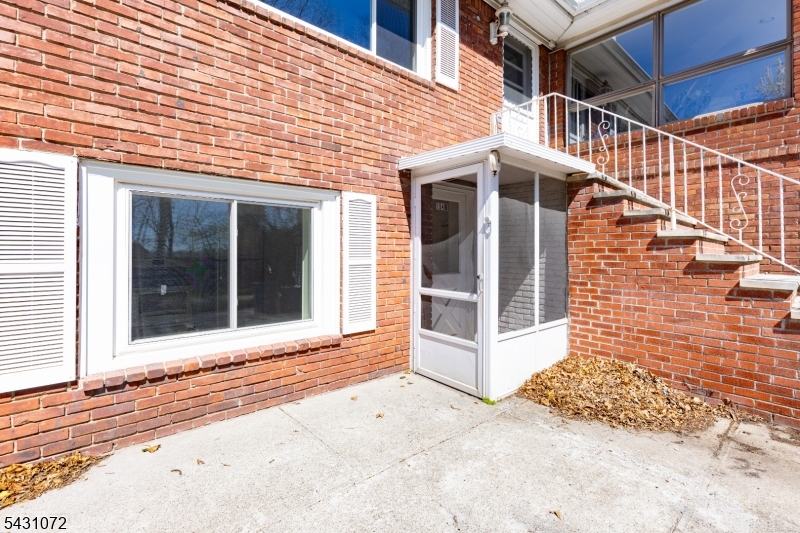 154 Ames Street Hackensack, NJ 07601 - Photo 1 of 12 a view of a white house with a large window