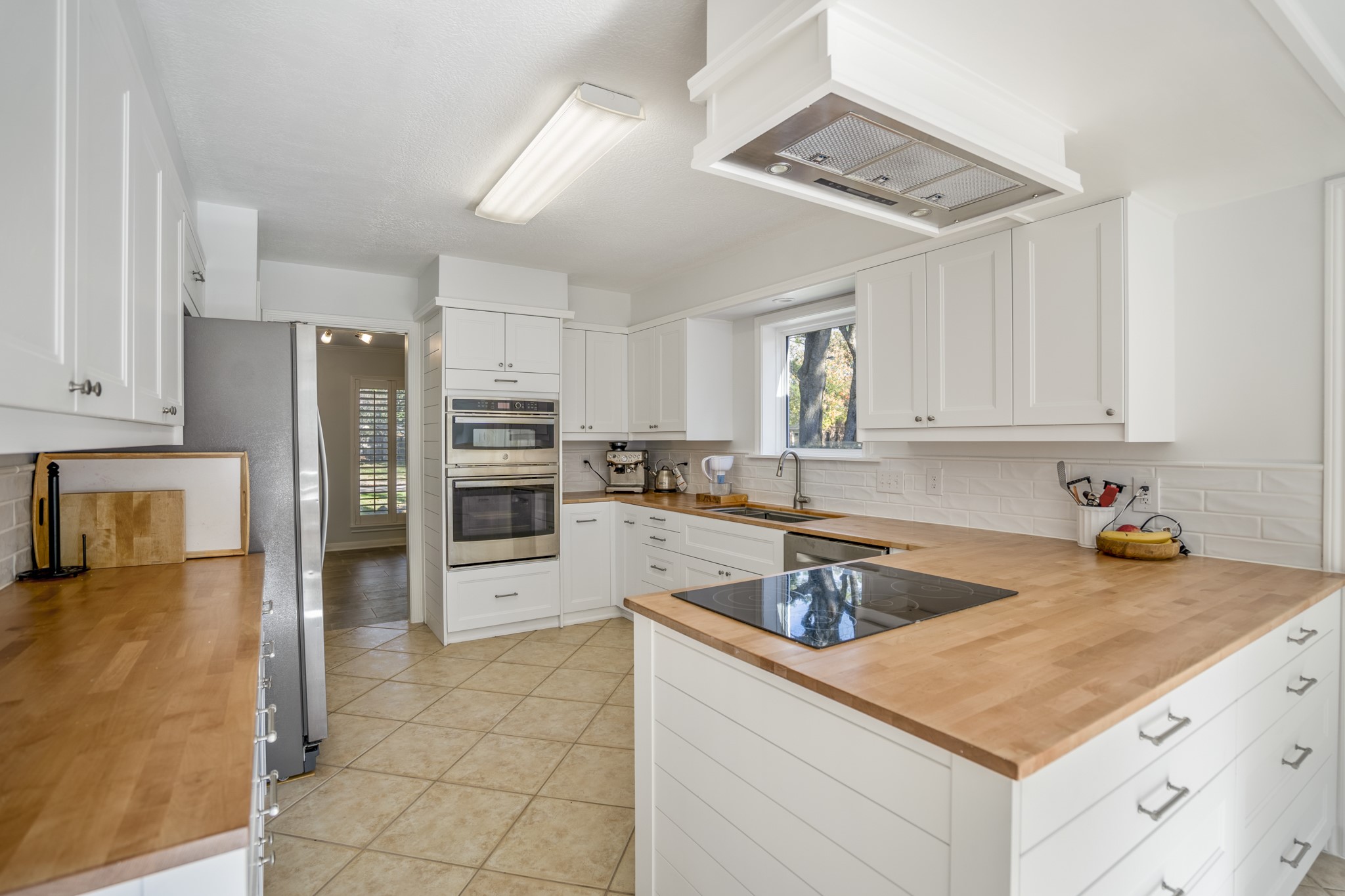 9507 Godstone Lane Spring, TX 77379 - Photo 12 of 42 The thoughtful upgrades include additional storage space facing towards the breakfast nook.