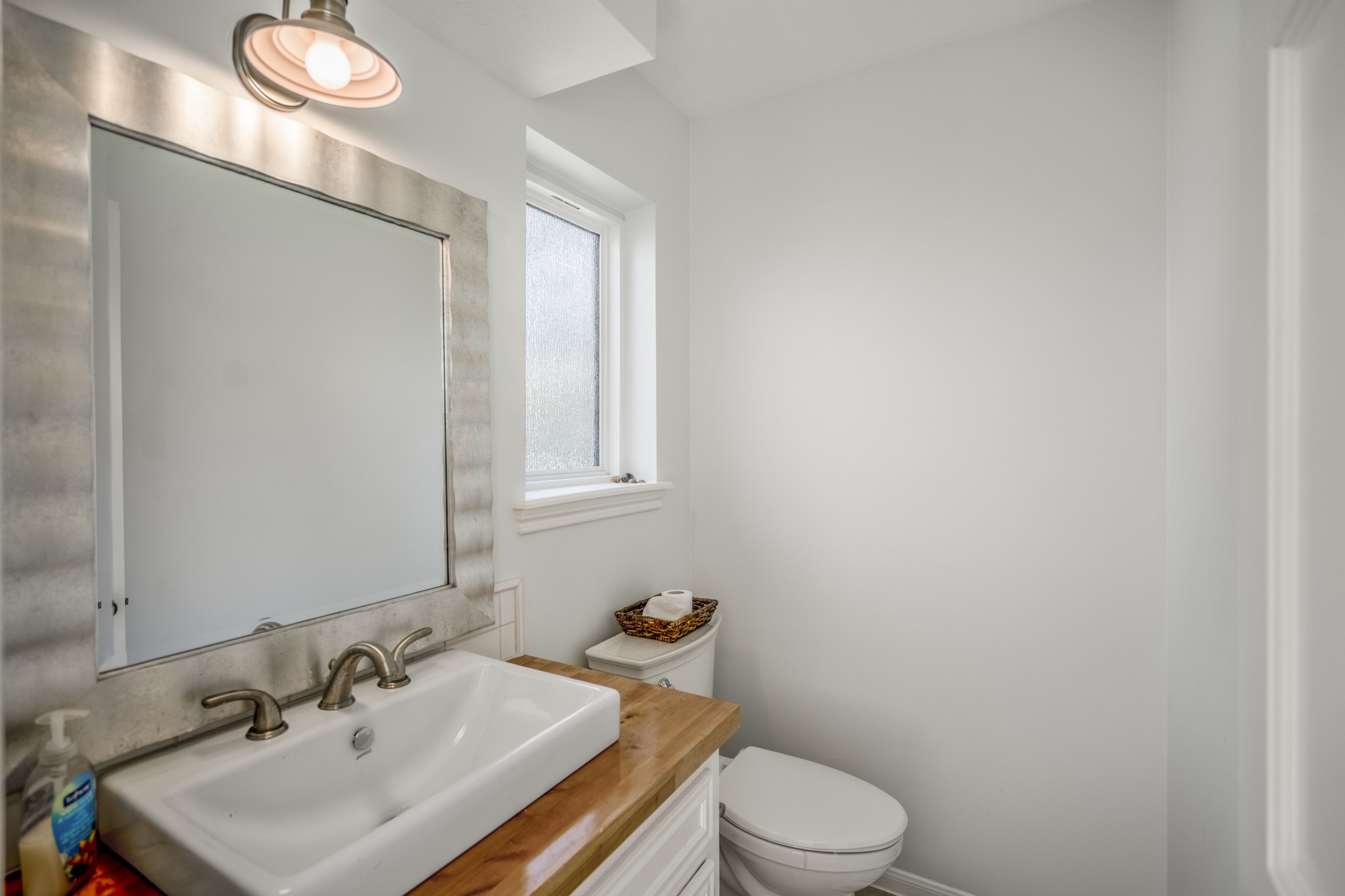 9507 Godstone Lane Spring, TX 77379 - Photo 17 of 42 This half bath is right off the breakfast nook, and conveniently located near the back door of the home for easy access.