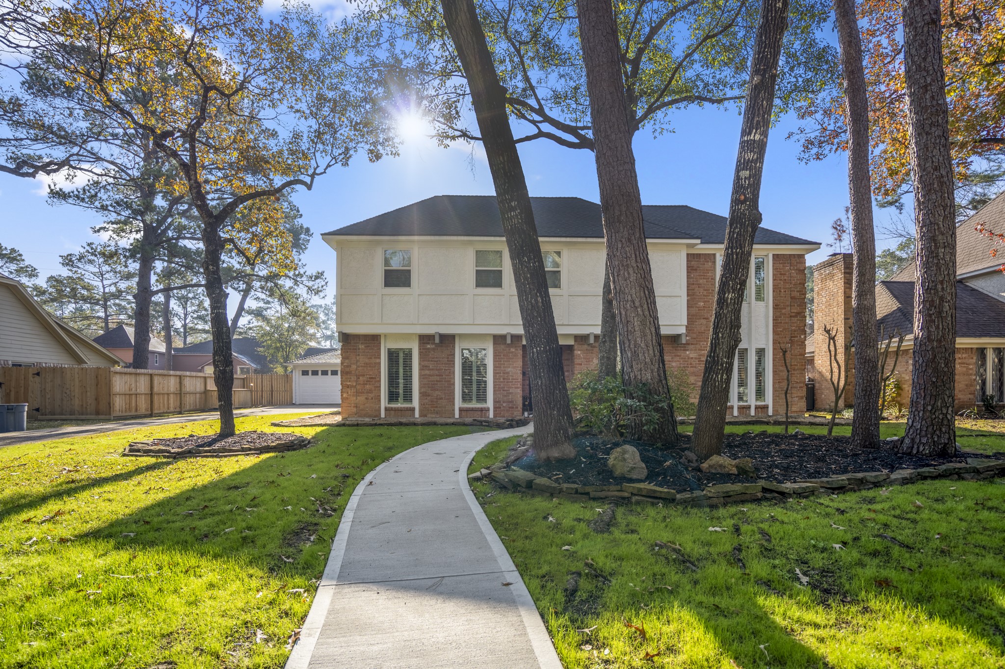 9507 Godstone Lane Spring, TX 77379 - Photo 2 of 42 The graceful walkway is a recent addition to the home.