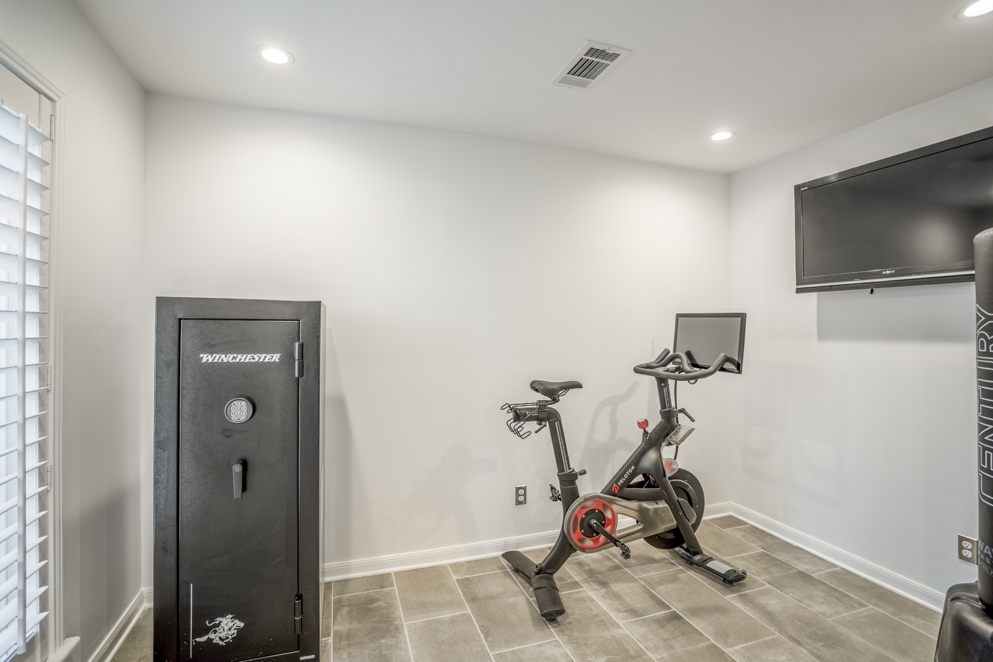 9507 Godstone Lane Spring, TX 77379 - Photo 22 of 42 The bonus space also has plantation shutters, and is large enough to be a small office, workout room, or just additional storage.