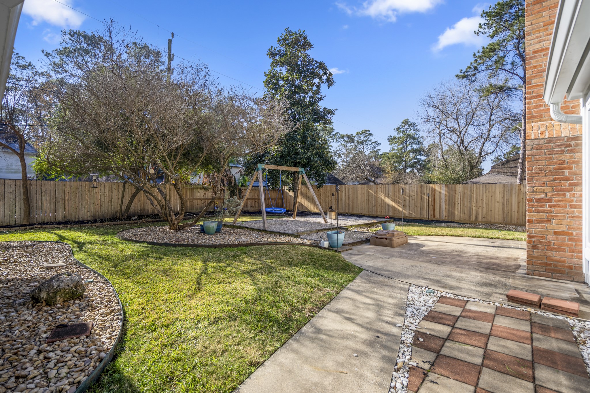 9507 Godstone Lane Spring, TX 77379 - Photo 37 of 42 The back yard! Thoughtfully landscaped for play and relaxation.