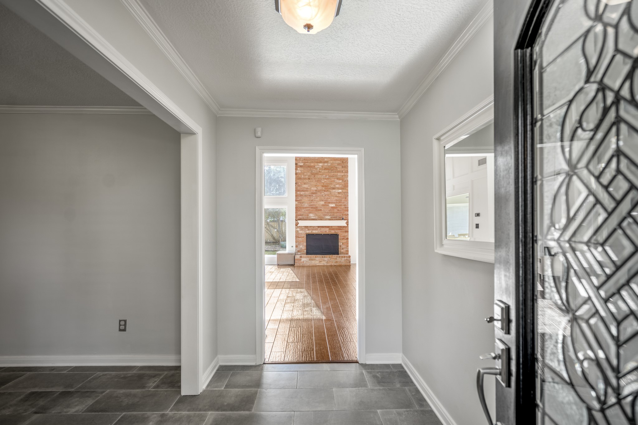 9507 Godstone Lane Spring, TX 77379 - Photo 4 of 42 The foyer leads you into the heart of the home.