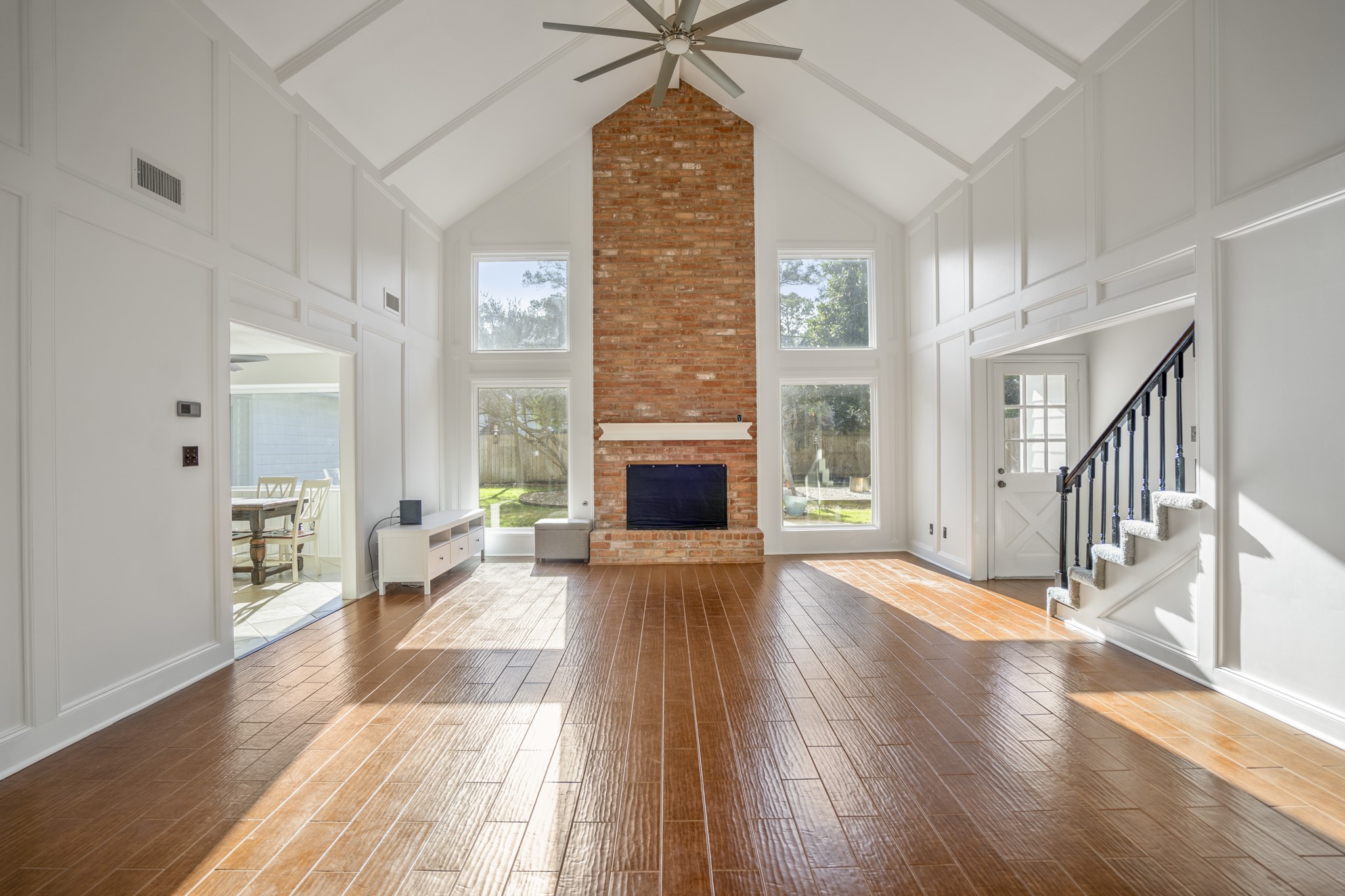 9507 Godstone Lane Spring, TX 77379 - Photo 8 of 42 The main living area, with warm ceramic flooring, large picture windows that allow lots of light and beautiful views.
