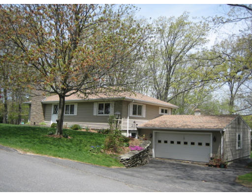30 Laurelwood Road Rutland, MA 01543 - Photo 1 of 21 a front view of a house with garden