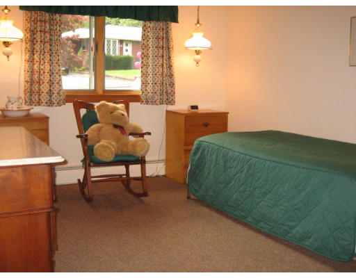 30 Laurelwood Road Rutland, MA 01543 - Photo 14 of 21 a living room with a bed furniture and a large window