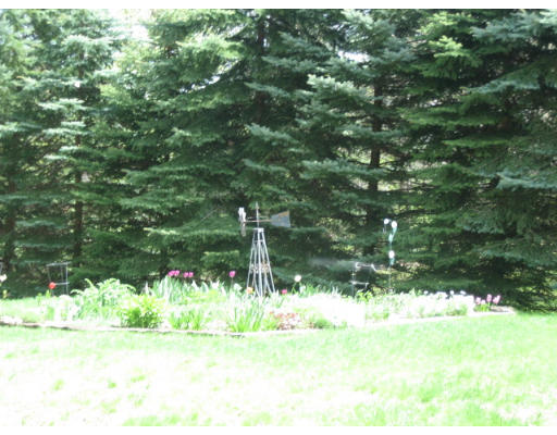 30 Laurelwood Road Rutland, MA 01543 - Photo 19 of 21 a backyard of a house with a yard and outdoor seating