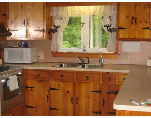 30 Laurelwood Road Rutland, MA 01543 - Photo 3 of 21 a bathroom with a sink and a large mirror