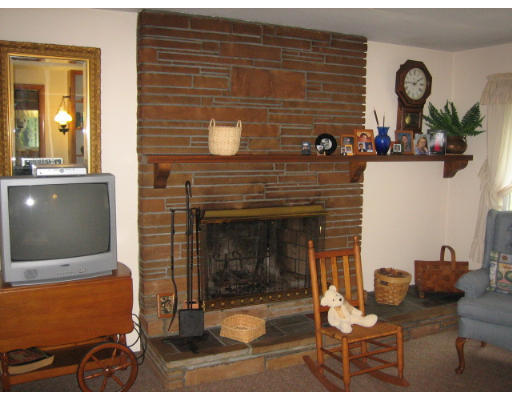 30 Laurelwood Road Rutland, MA 01543 - Photo 7 of 21 a living room with furniture and a fireplace