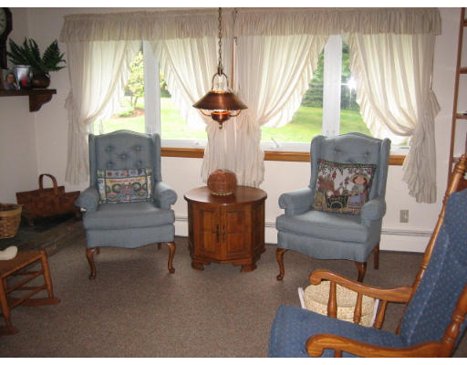 30 Laurelwood Road Rutland, MA 01543 - Photo 9 of 21 a living room with furniture and a large window