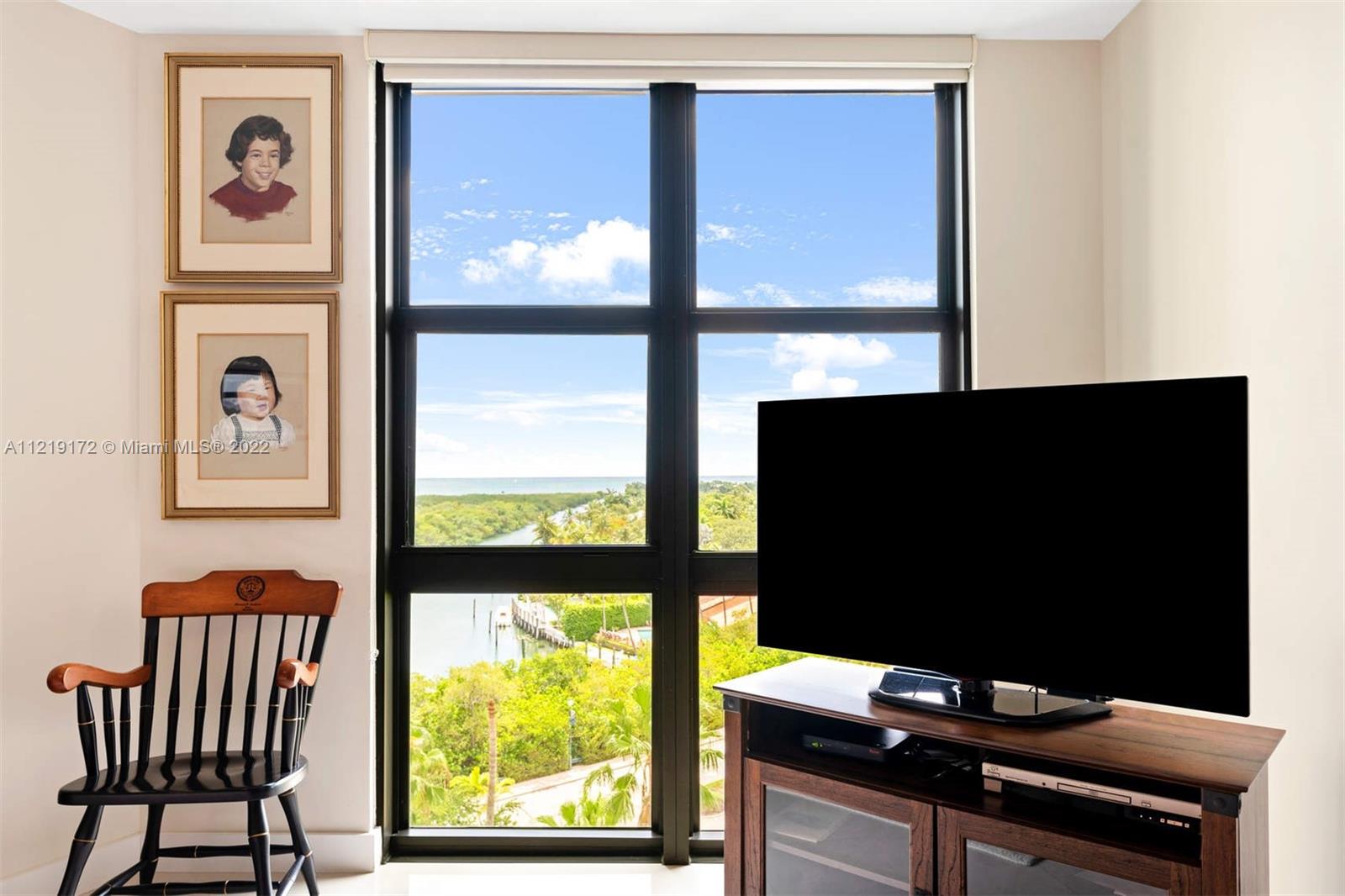 1121 Crandon Boulevard, Unit E801 Key Biscayne, FL 33149 - Photo 13 of 29 a view of a workspace with furniture and window