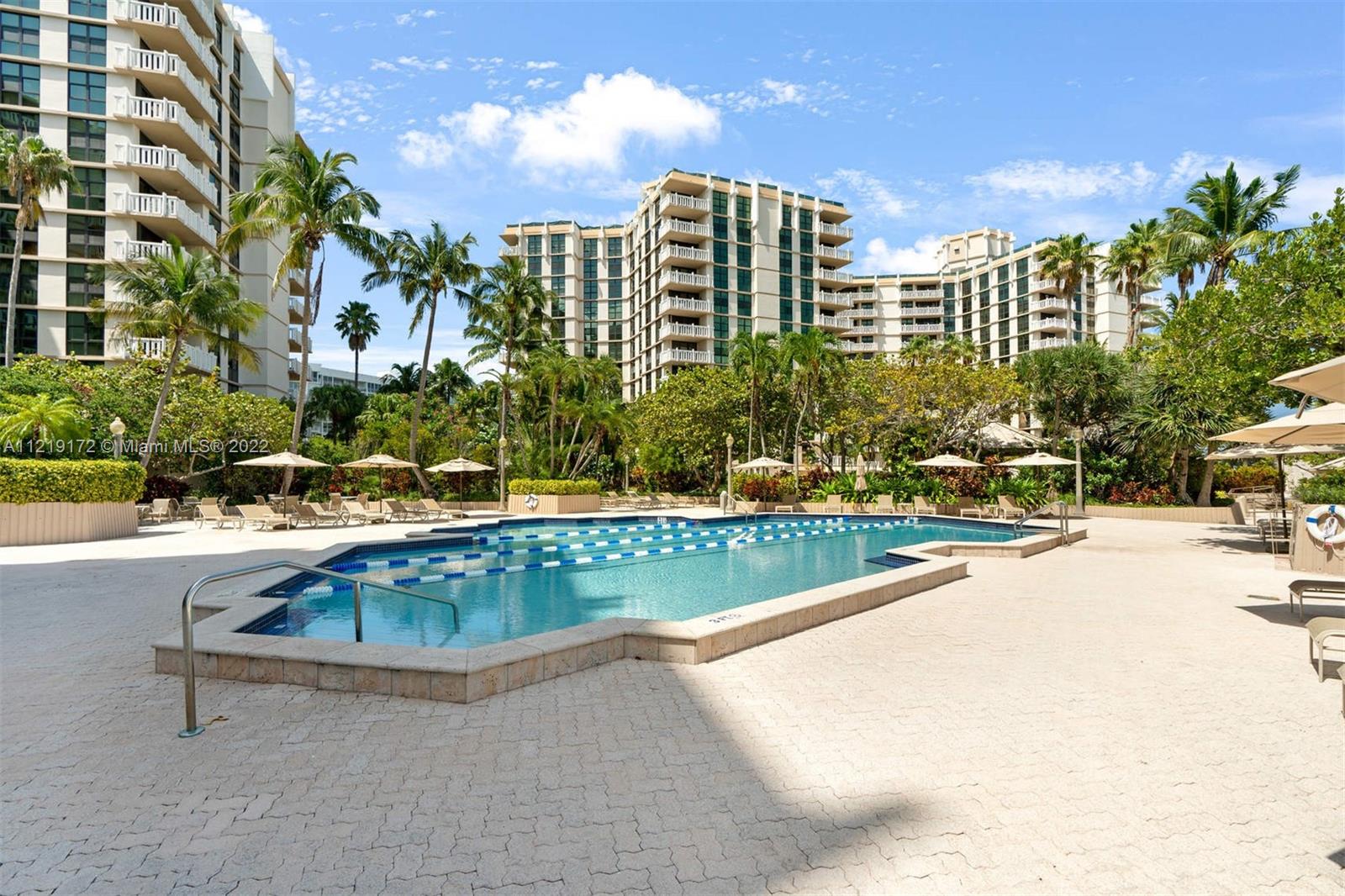 1121 Crandon Boulevard, Unit E801 Key Biscayne, FL 33149 - Photo 21 of 29 a view of swimming pool from a outdoor space