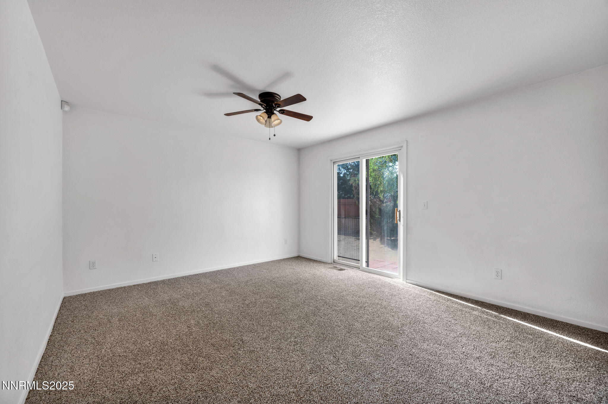 115 Calistoga Court Reno, NV 89508 - Photo 15 of 58 a view of an empty room with a window