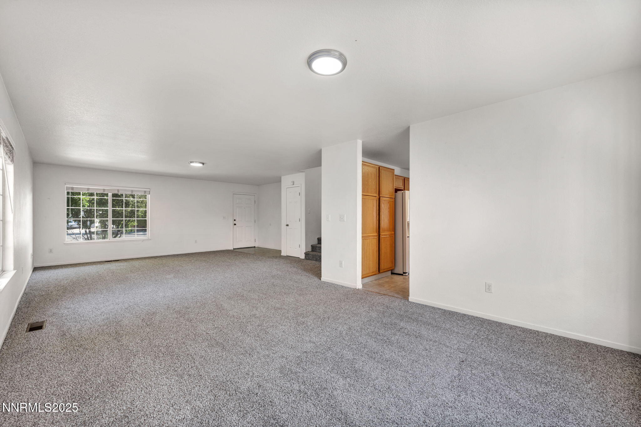 115 Calistoga Court Reno, NV 89508 - Photo 16 of 58 an empty room with windows and closet