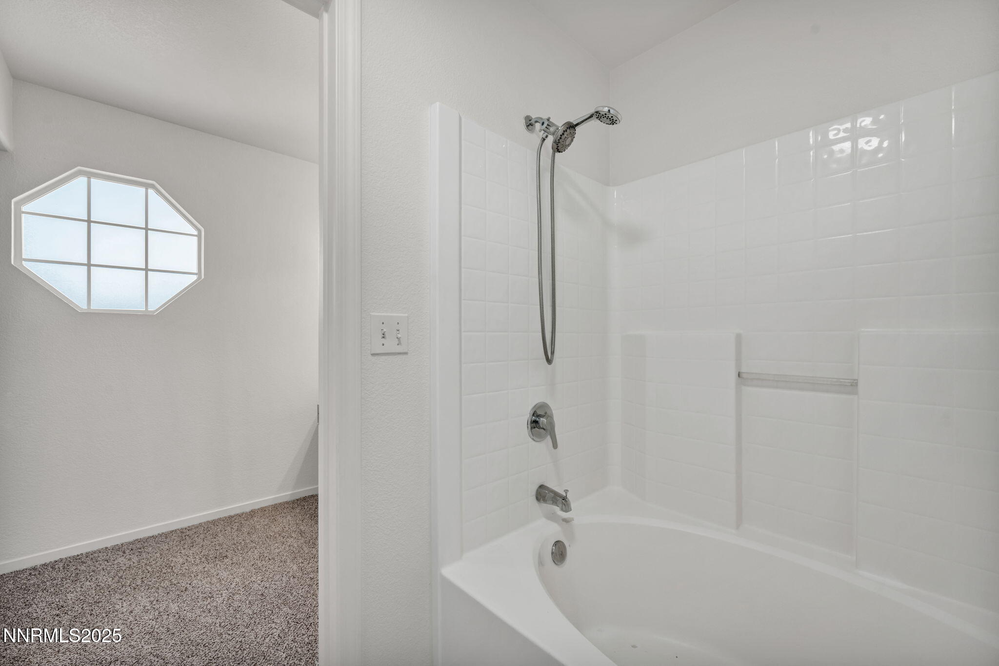 115 Calistoga Court Reno, NV 89508 - Photo 36 of 58 a bathroom with a bathtub and a shower