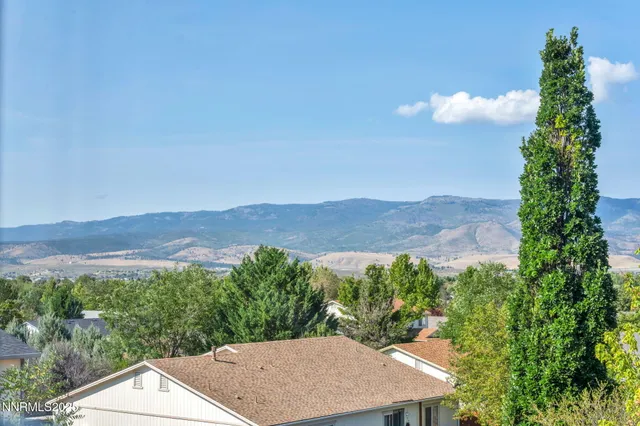 an aerial view of residential house with an outdoor space