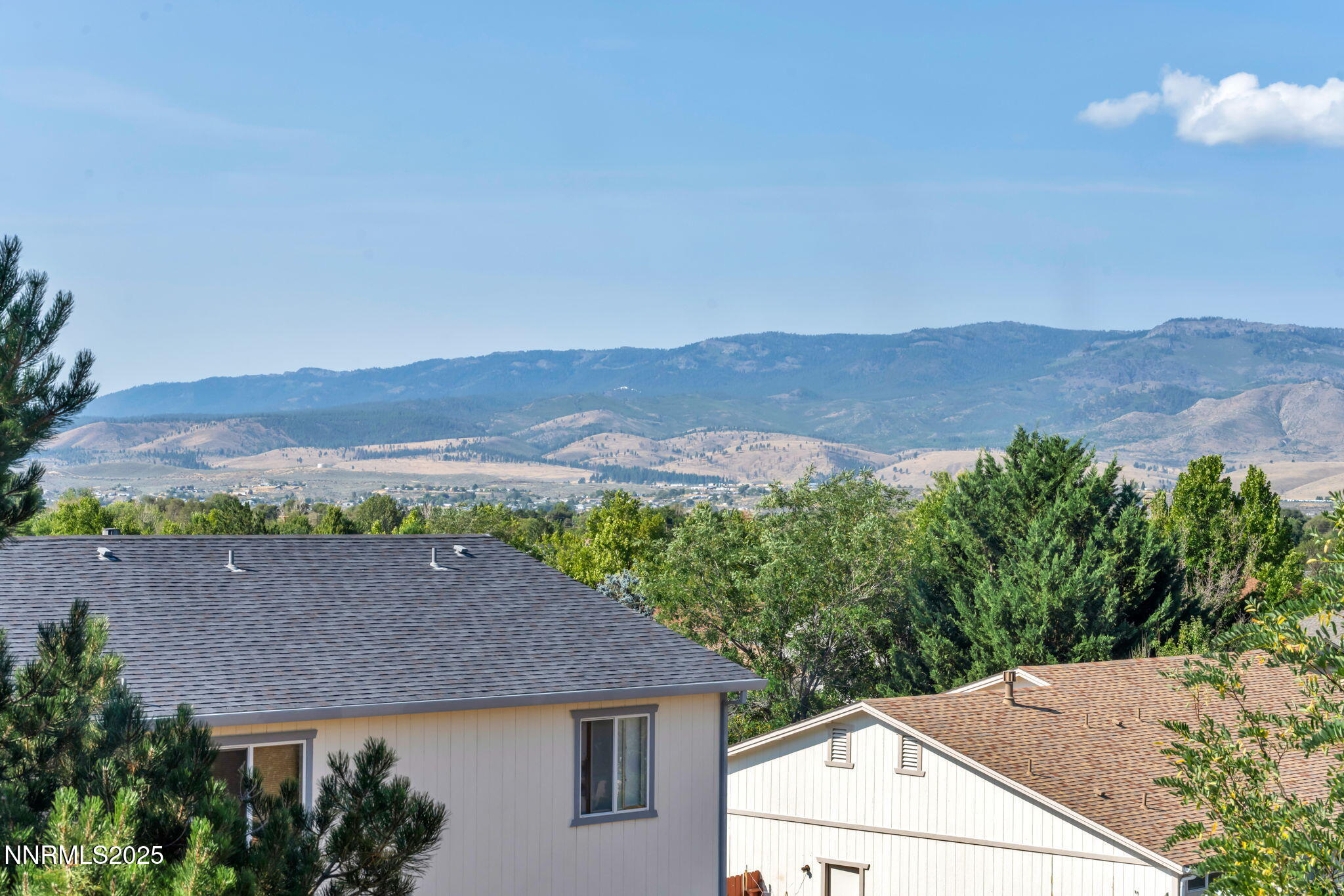 115 Calistoga Court Reno, NV 89508 - Photo 50 of 58 an aerial view of a house with mountain view