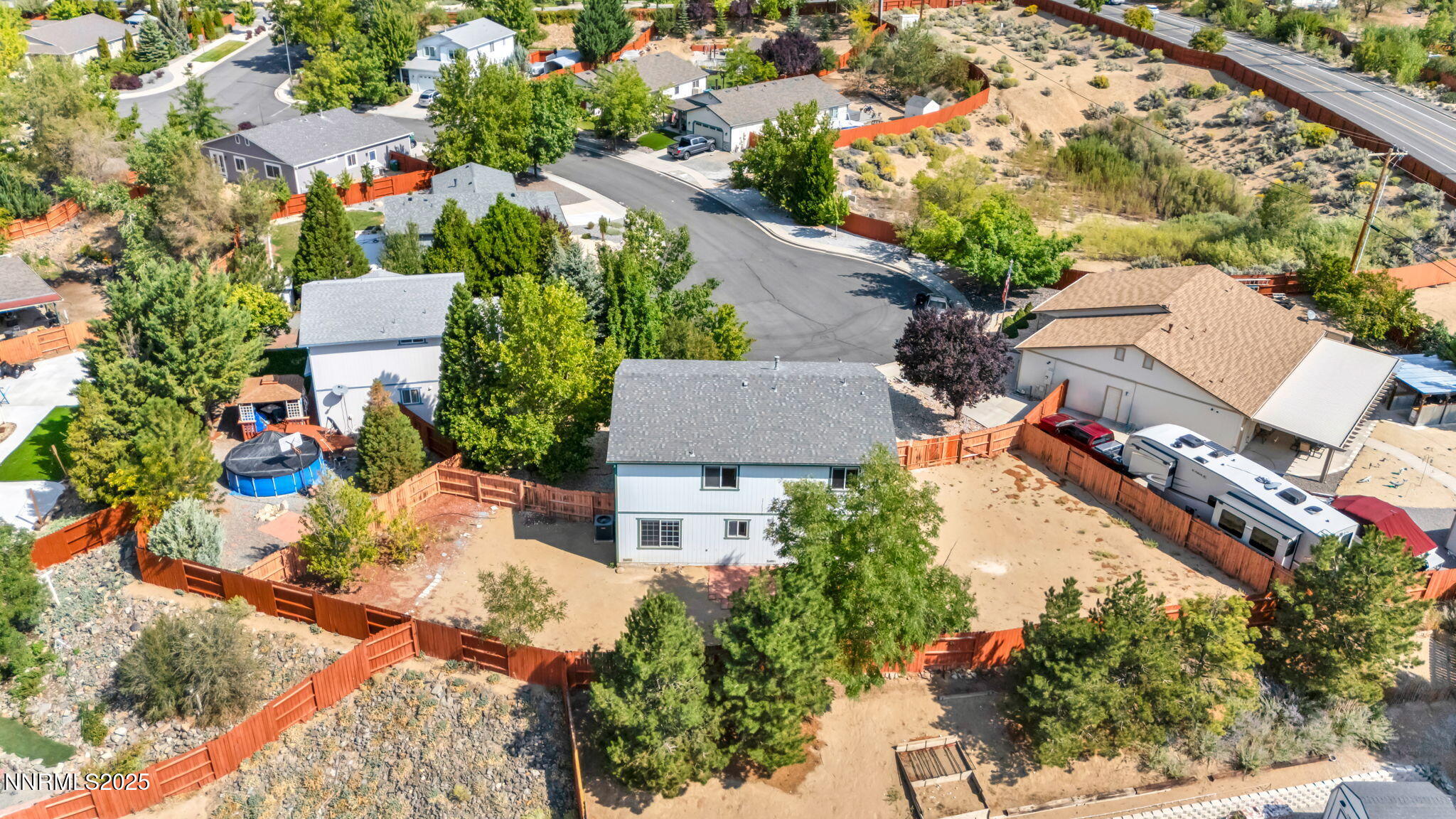 115 Calistoga Court Reno, NV 89508 - Photo 52 of 58 an aerial view of a house with a yard and lake view