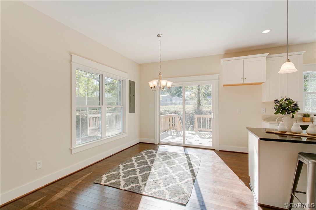 15812 Harrowgate Road Chester, VA 23831 - Photo 13 of 31 a view of an empty room with wooden floor and a window