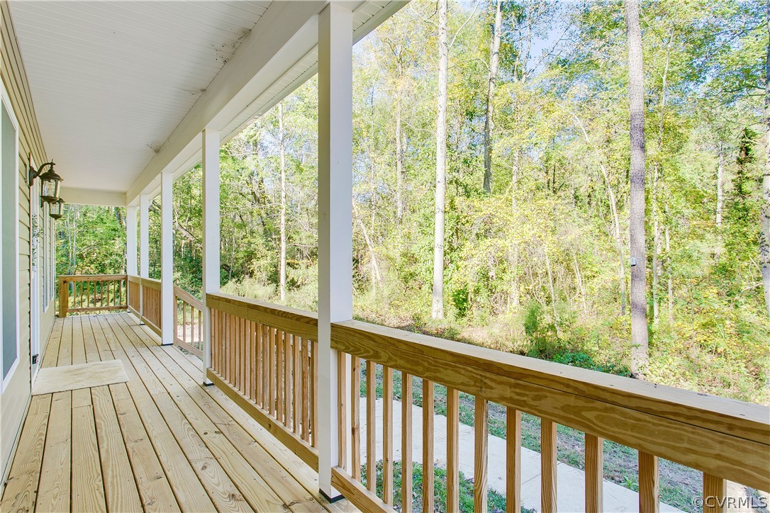 15812 Harrowgate Road Chester, VA 23831 - Photo 3 of 31 a view of a wooden deck with a yard