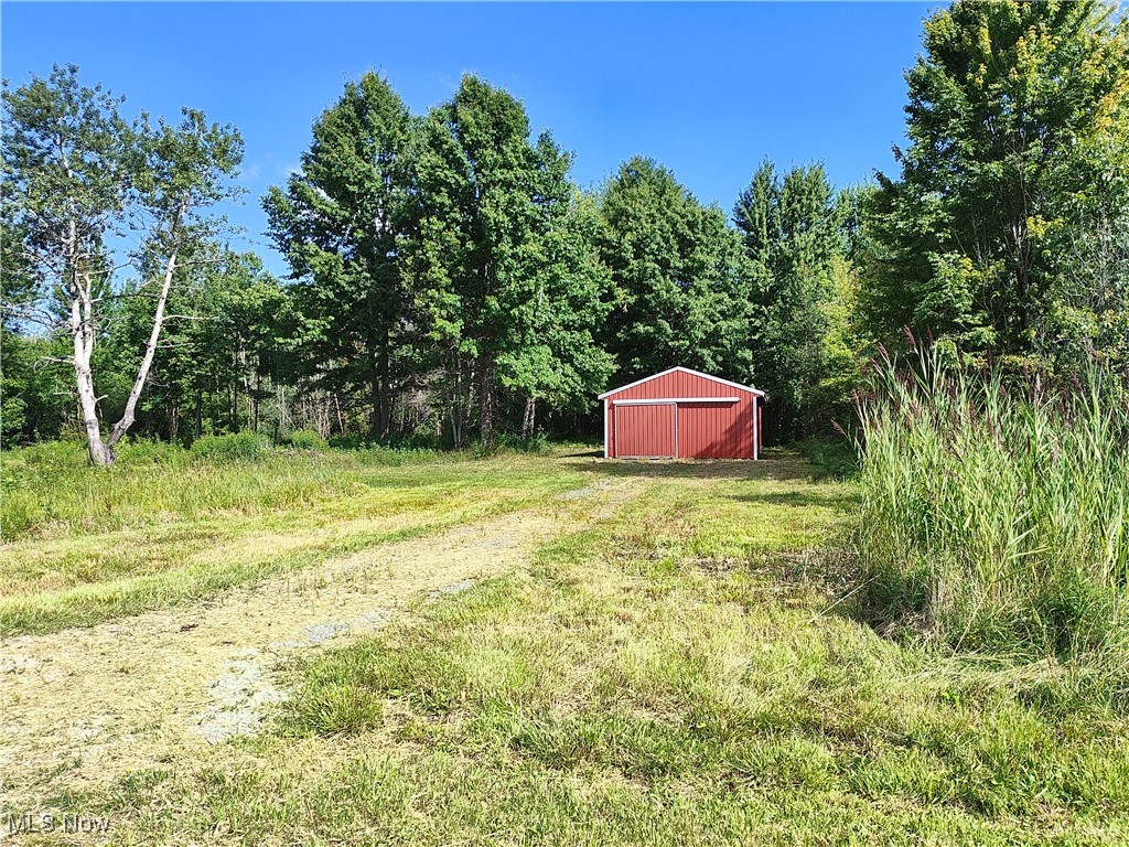 Vl New London Road Geneva, OH 44041 - Photo 2 of 10 View of yard with an outbuilding