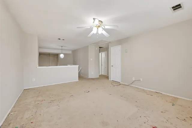 an empty room with a bathroom