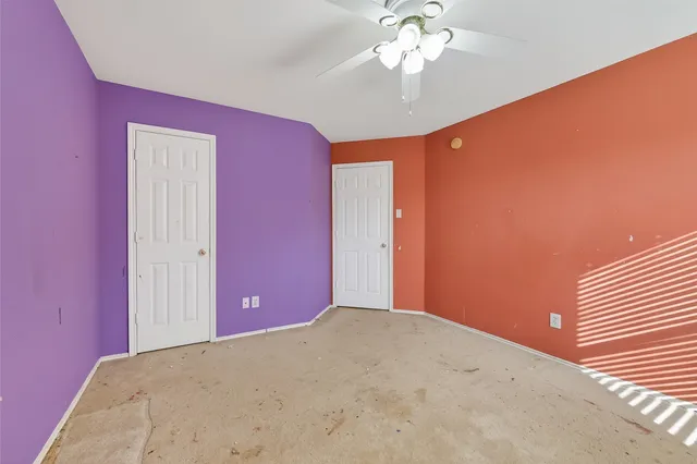 a view of a livingroom with a ceiling fan