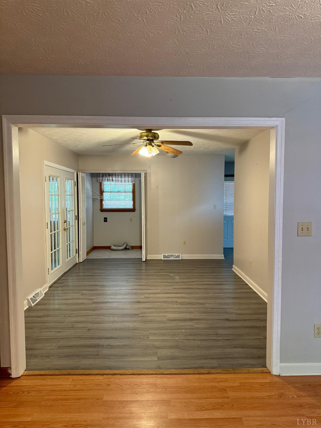 580 First Rock Road Prospect, VA 23960 - Photo 8 of 22 a view of a room with wooden floor and staircase