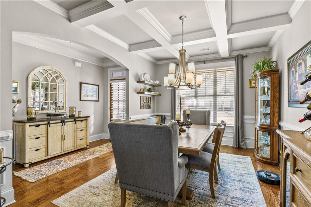 585 Hanover Drive Villa Rica, GA 30180 - Photo 13 of 72 a view of a dining room with furniture window and wooden floor