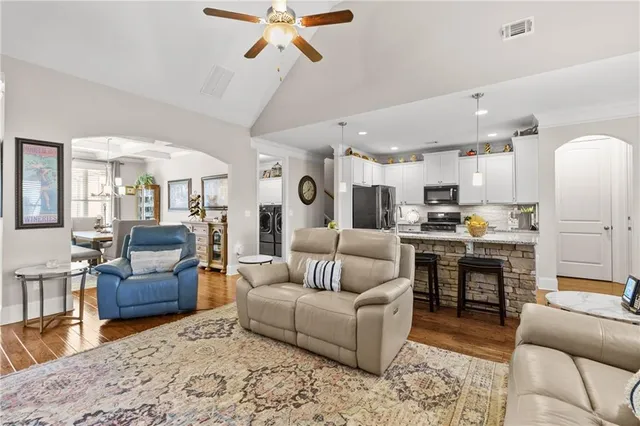 a outdoor living space with furniture and a floor to ceiling window
