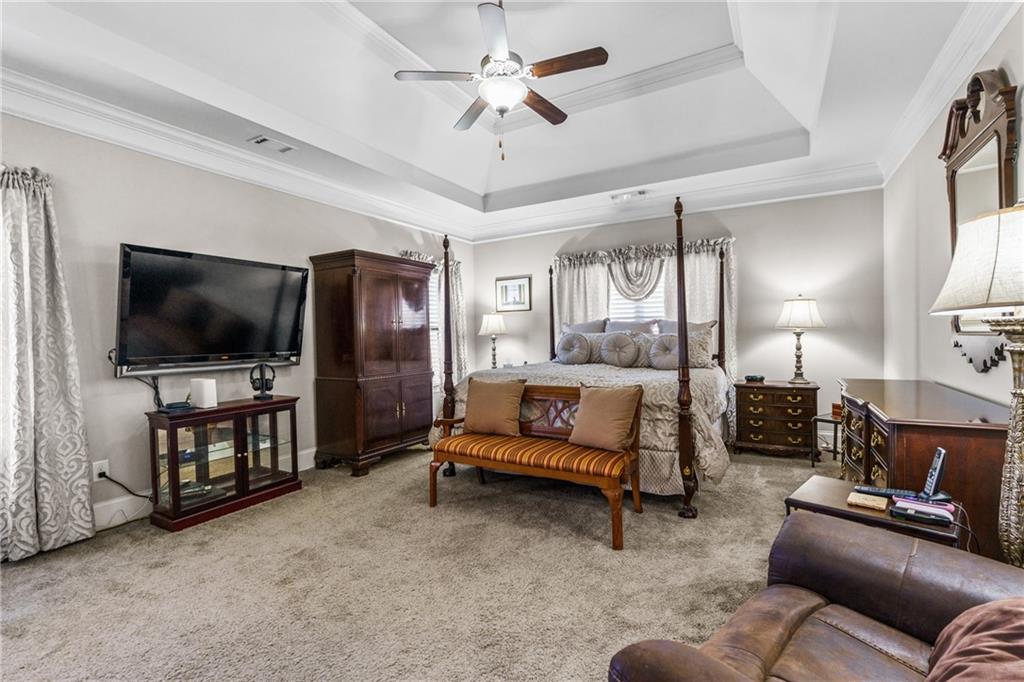 585 Hanover Drive Villa Rica, GA 30180 - Photo 25 of 72 a living room with furniture and a flat screen tv