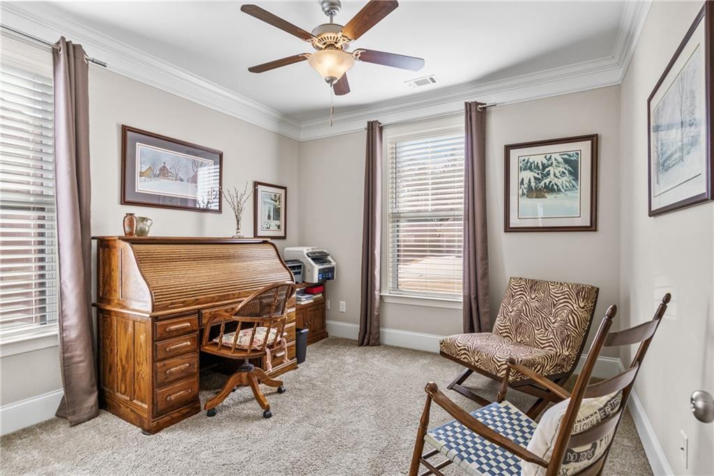 585 Hanover Drive Villa Rica, GA 30180 - Photo 35 of 72 a living room with furniture and a window