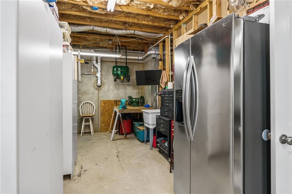 585 Hanover Drive Villa Rica, GA 30180 - Photo 49 of 72 a view of a refrigerator and storage area