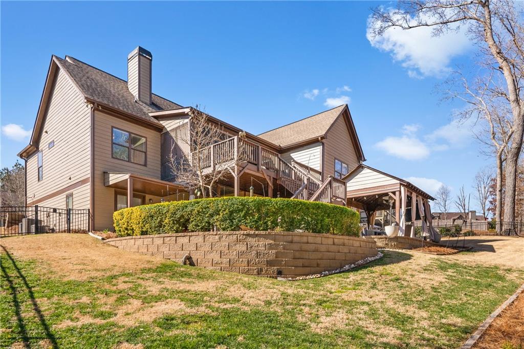 585 Hanover Drive Villa Rica, GA 30180 - Photo 55 of 72 a front view of a house with a yard