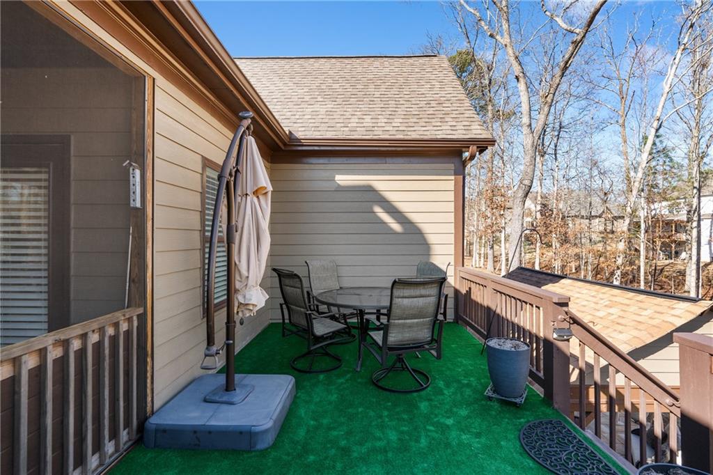 585 Hanover Drive Villa Rica, GA 30180 - Photo 56 of 72 a view of a chair and table in backyard of the house