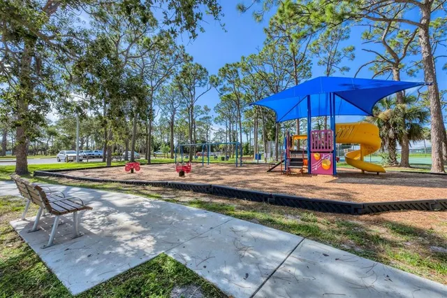 a view of a street with cars