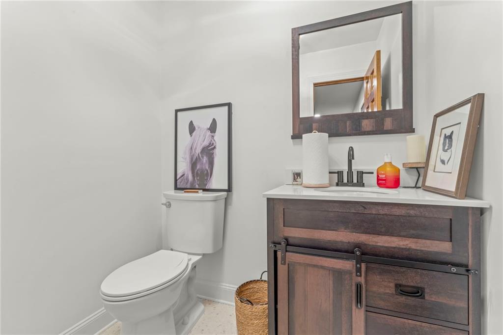 603 Highland Ridge Road Claysville, PA 15323 - Photo 22 of 47 a bathroom with a toilet a sink and mirror