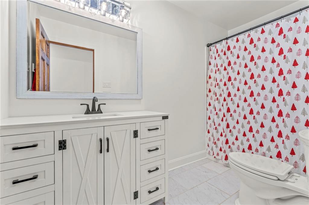 603 Highland Ridge Road Claysville, PA 15323 - Photo 29 of 47 a bathroom with a sink a vanity and a mirror